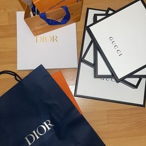 Various designer boxes, bags, ribbons Dior, LV, Gucci
